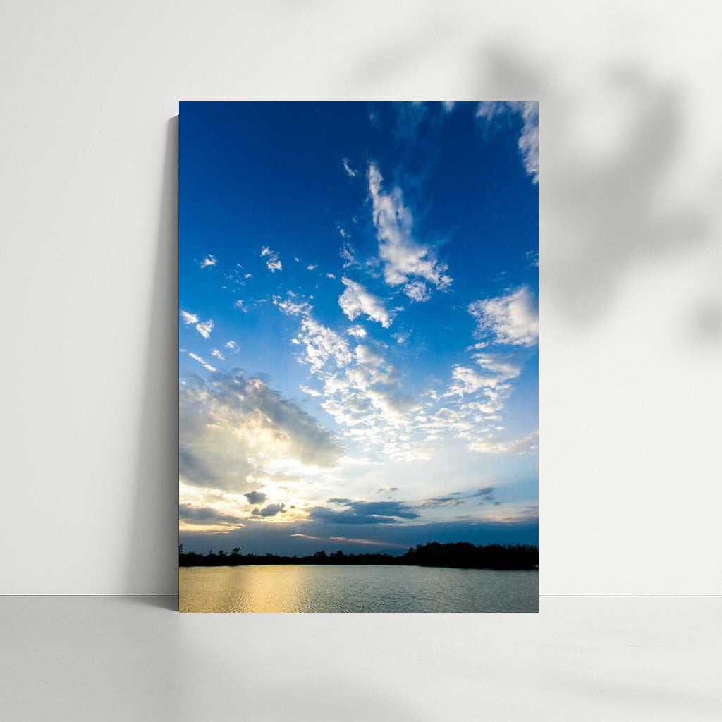 Cloud Dance: The Majesty of the Sky over the Calm Water