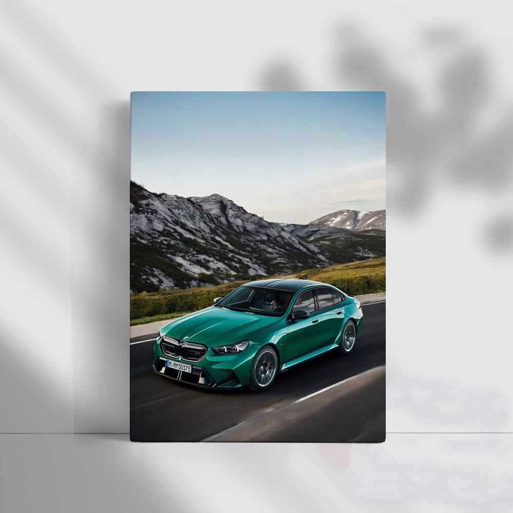 Green 2025 BMW M5 Cruising Through Majestic Mountains - Power Unleashed