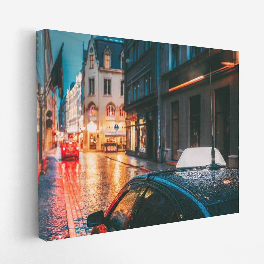 Evening Rain: Lights and Reflections on the City Streets