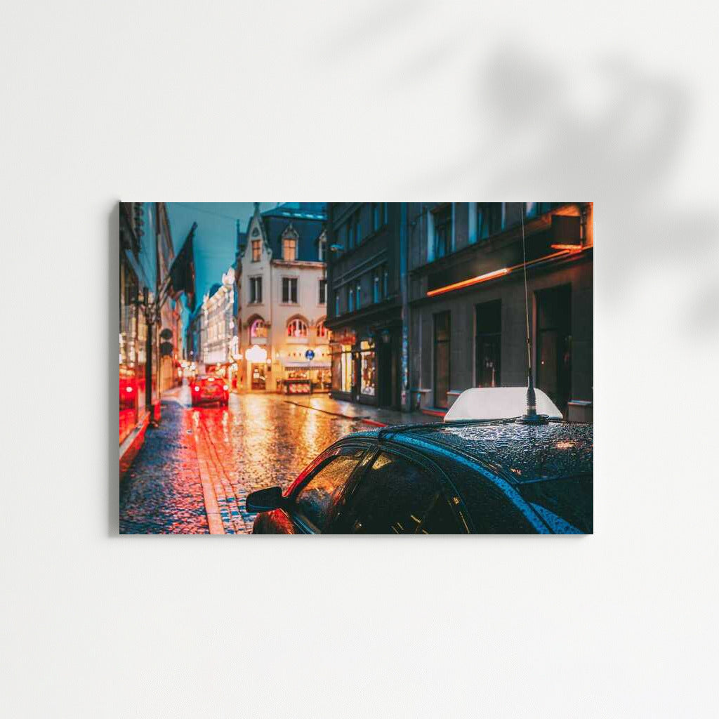 Evening Rain: Lights and Reflections on the City Streets