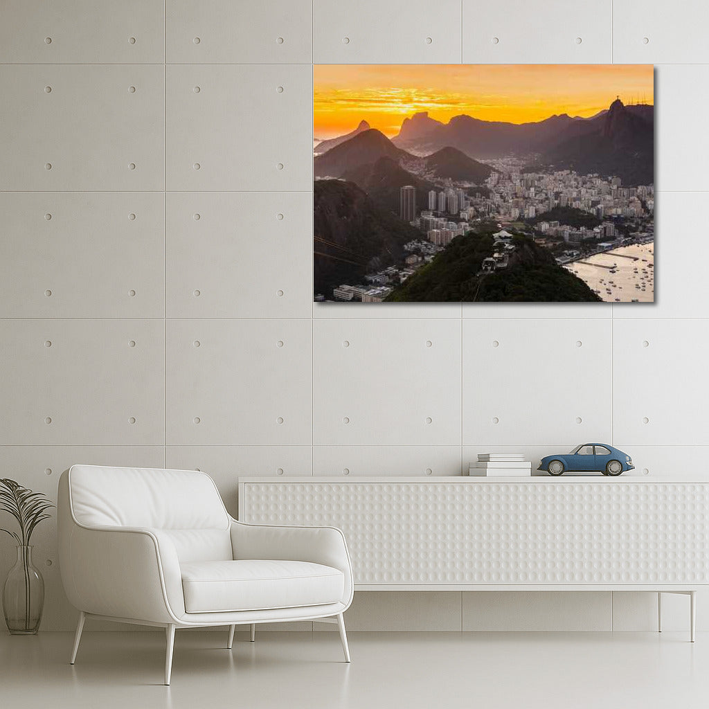Rio's Sunset Charm: City and Mountains Under Orange Sky
