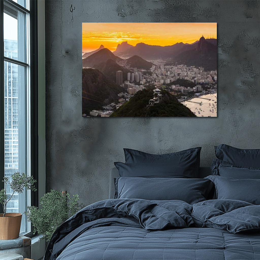 Rio's Sunset Charm: City and Mountains Under Orange Sky