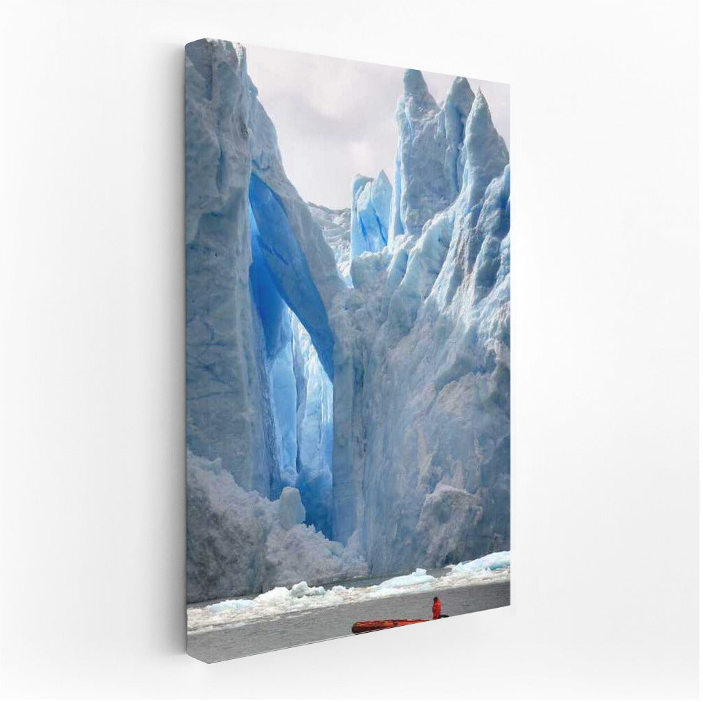 The Majesty of Icebergs: Ice Arches and the Colourful Boat