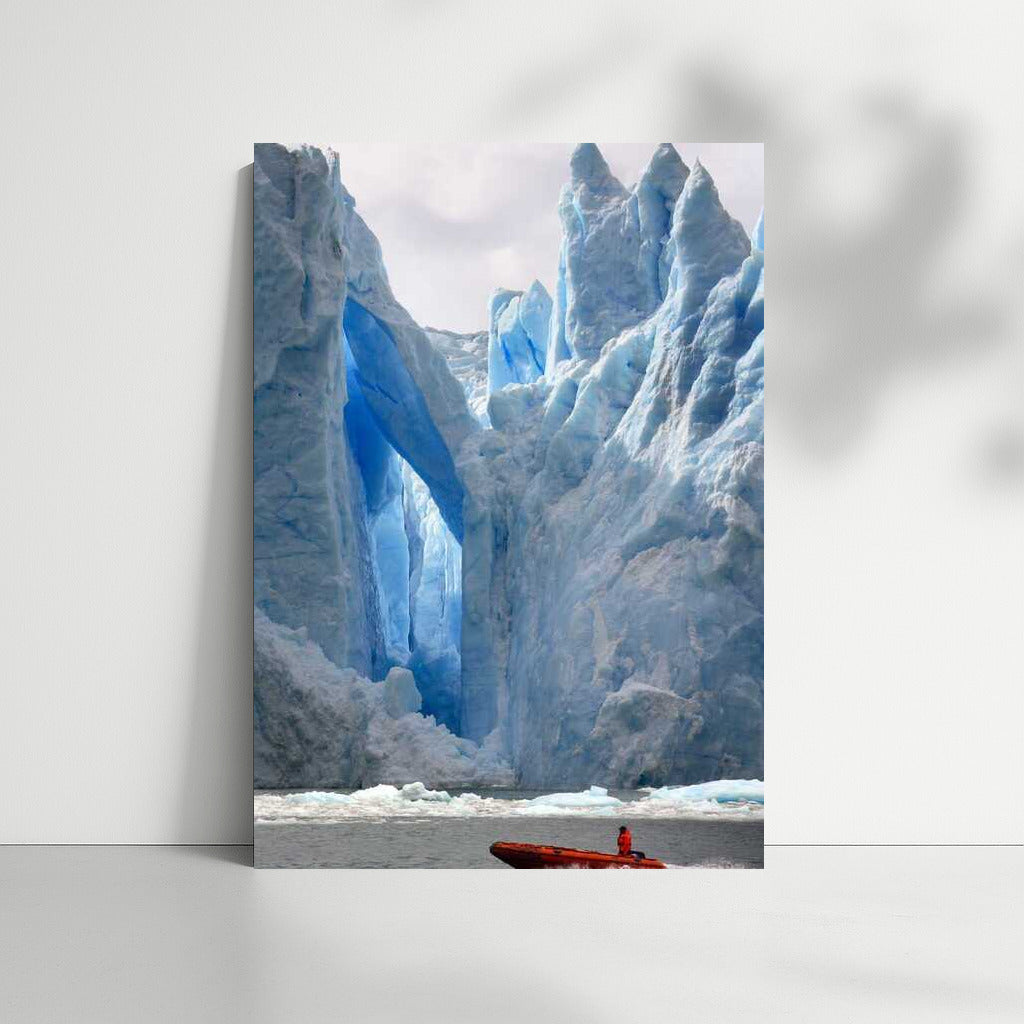 The Majesty of Icebergs: Ice Arches and the Colourful Boat