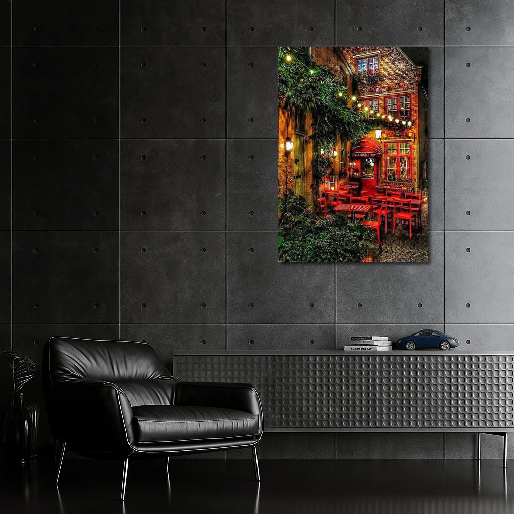 Evening Coziness of a Belgian Courtyard: Red Chairs and Light of Bulbs