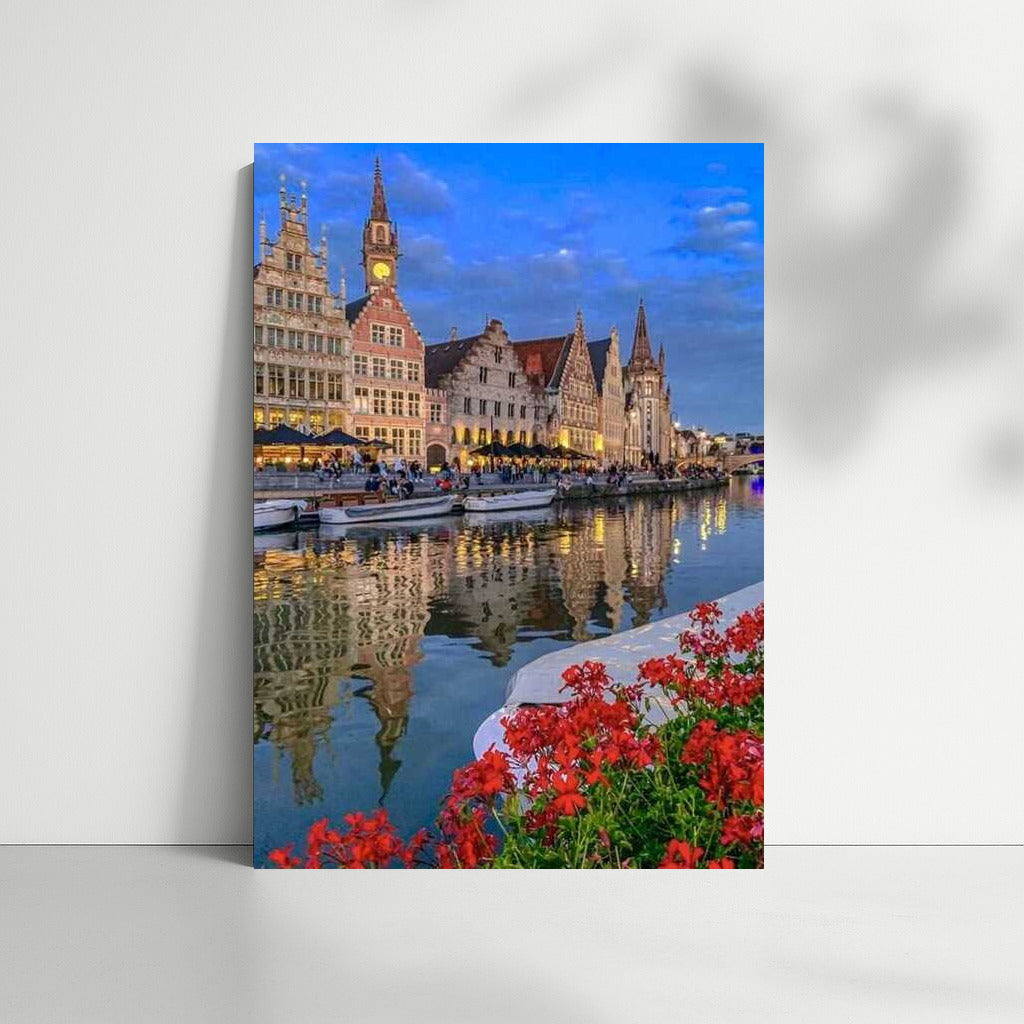 Evening Canal of Belgium: Historical Architecture and Floral Reflections