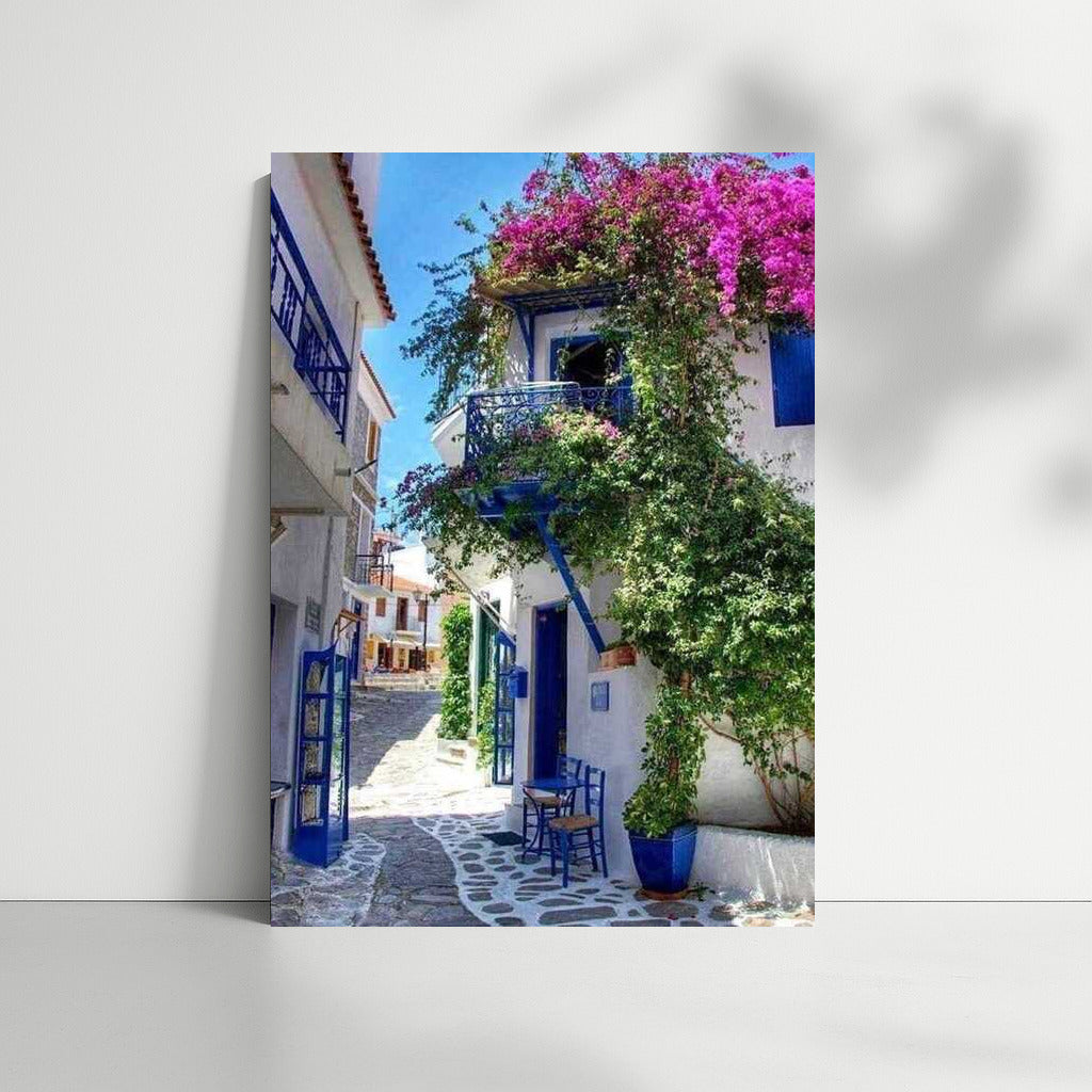 The Charm of a Greek Idyll: Blue and White Houses and Flowers