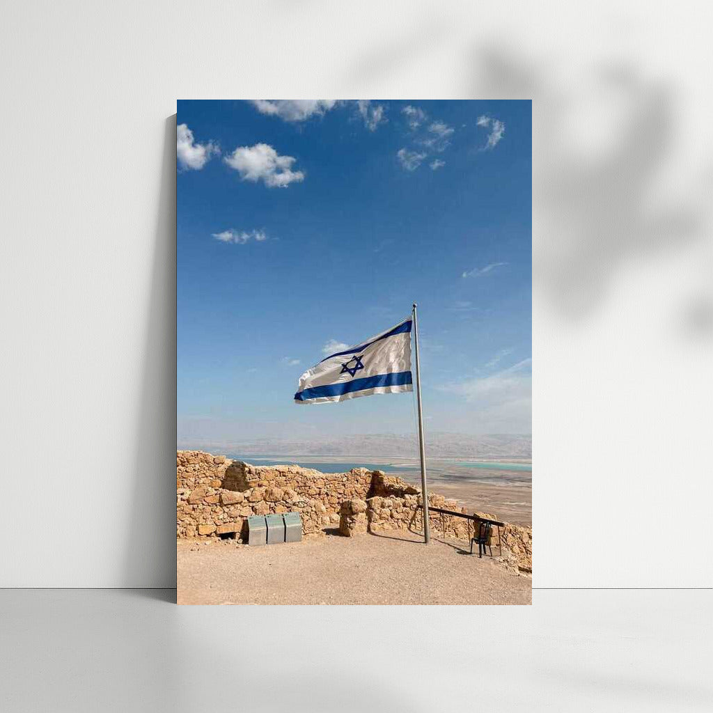 Proud Flag of Israel: Symbol of the Country on the Background of Ancient Stones and Blue Sky