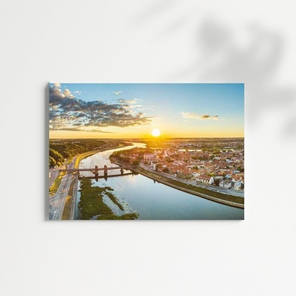 Sunset over the River and the Old Town of Lithuania: Tranquility and Atmosphere of the Country