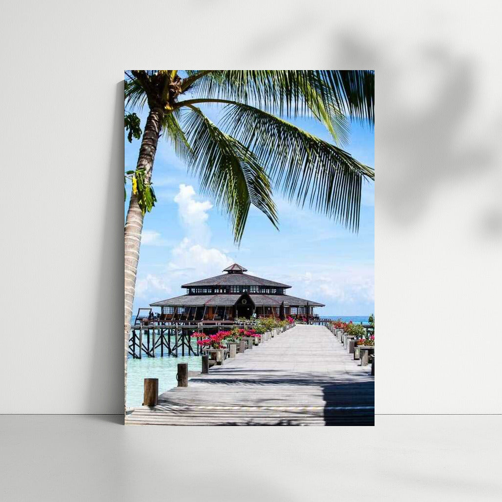 Tropical Coziness: Wooden Pier and Palm House in Malaysia