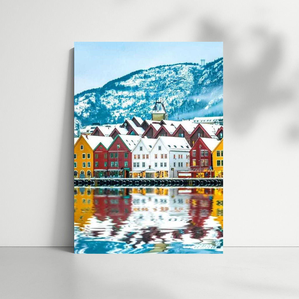 Vibrant Norwegian Homes by Calm Water and Snowy Mountains