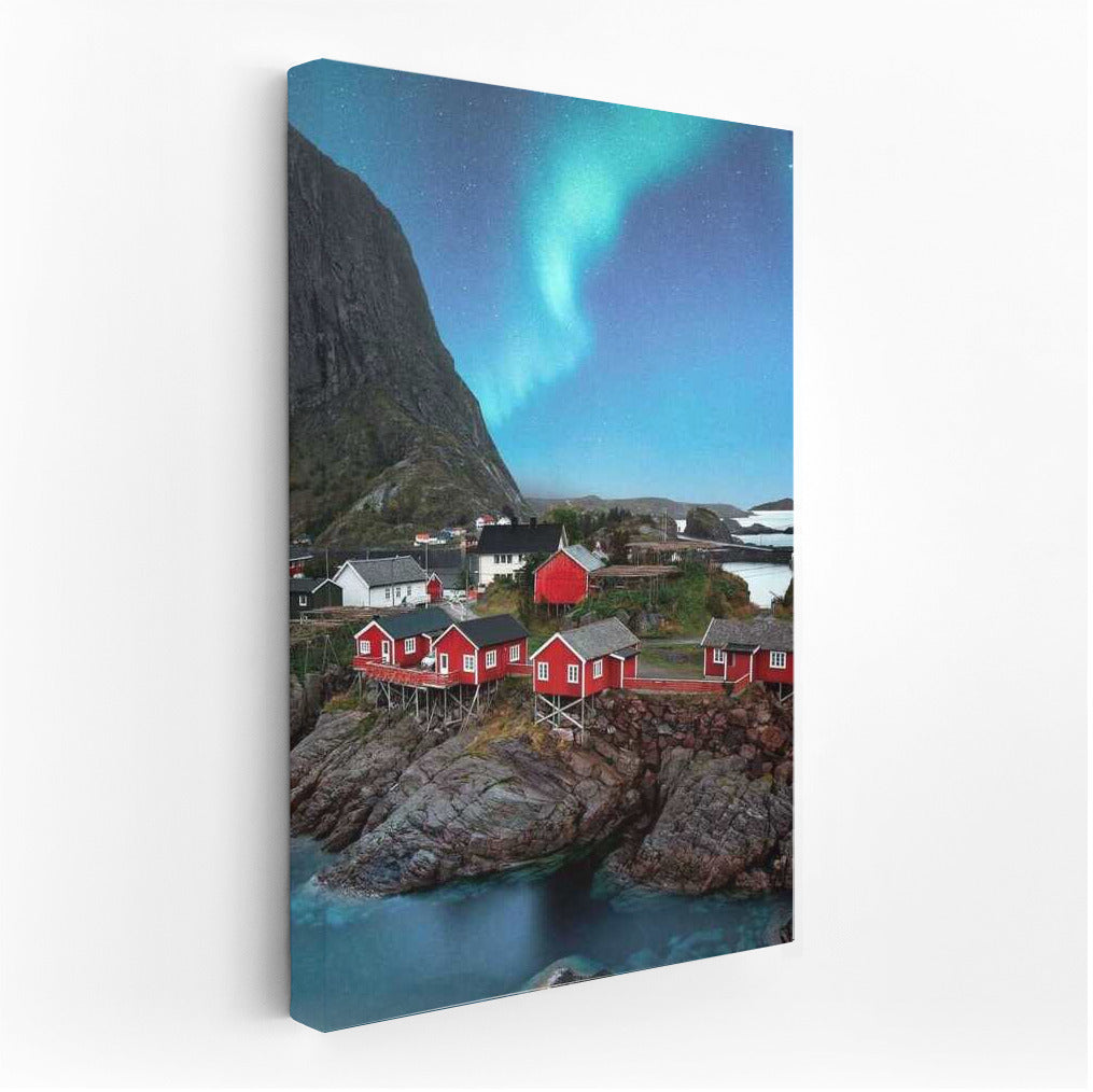 Northern Lights over the Red Houses of Norway: The Atmosphere of Scandinavia