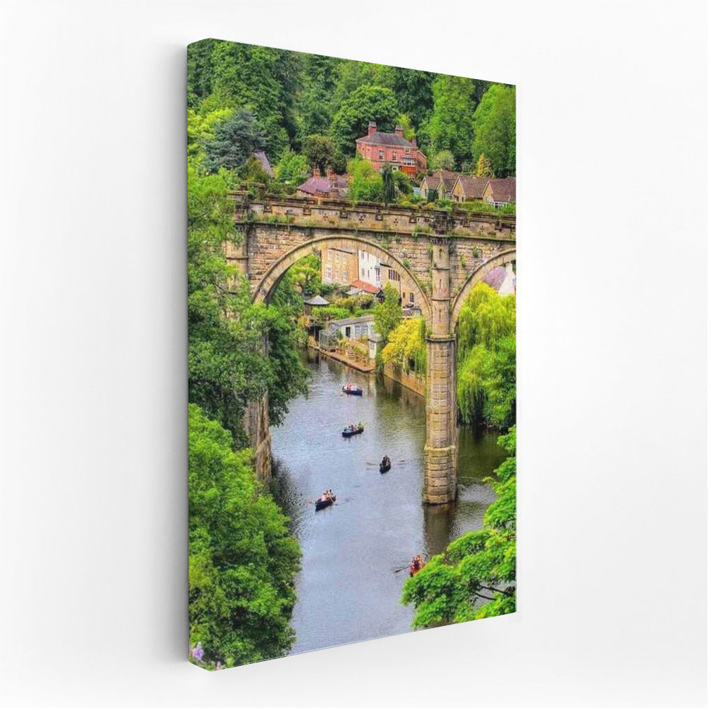 Arch Bridge and Boats: The Charm of the British Landscape