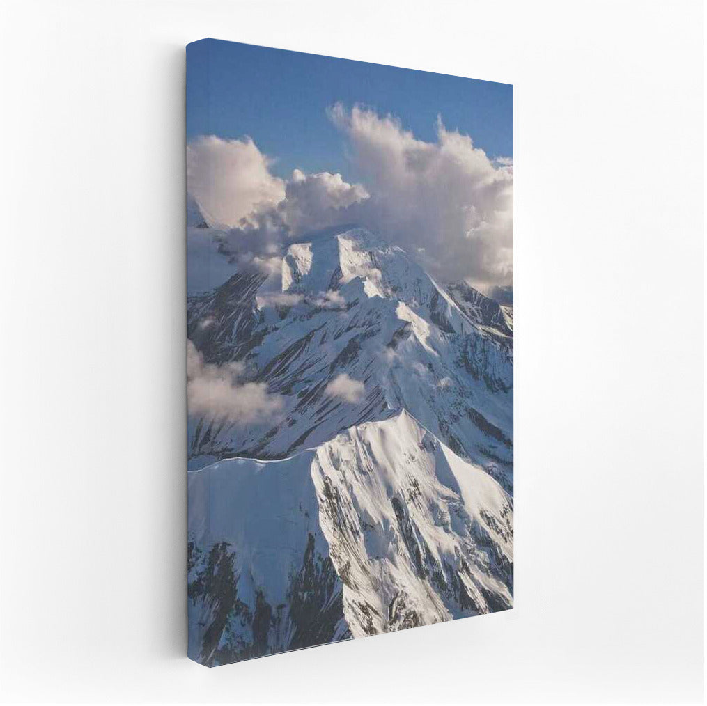 Alaska's Grandeur: Snowy Mountains and Clouds USA
