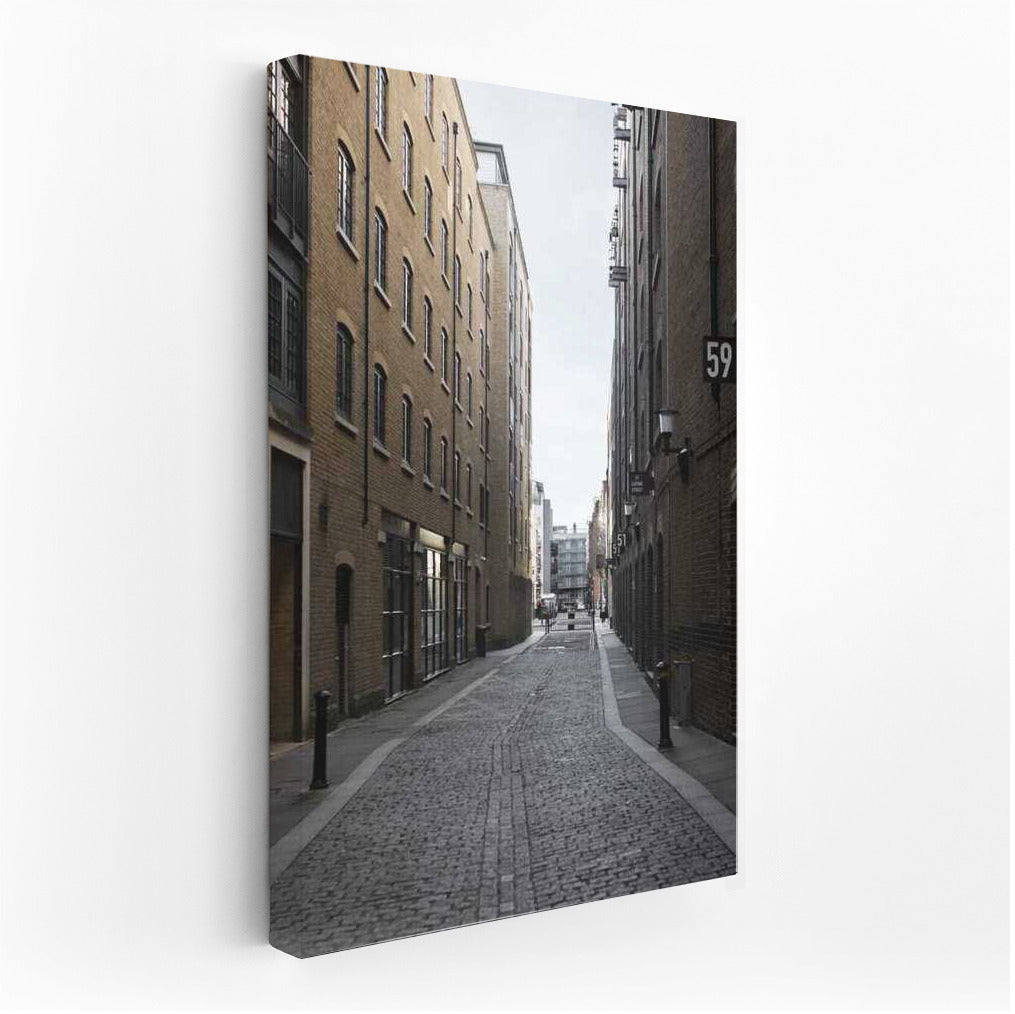 Urban Symphony: Narrow Street Between Brick Buildings