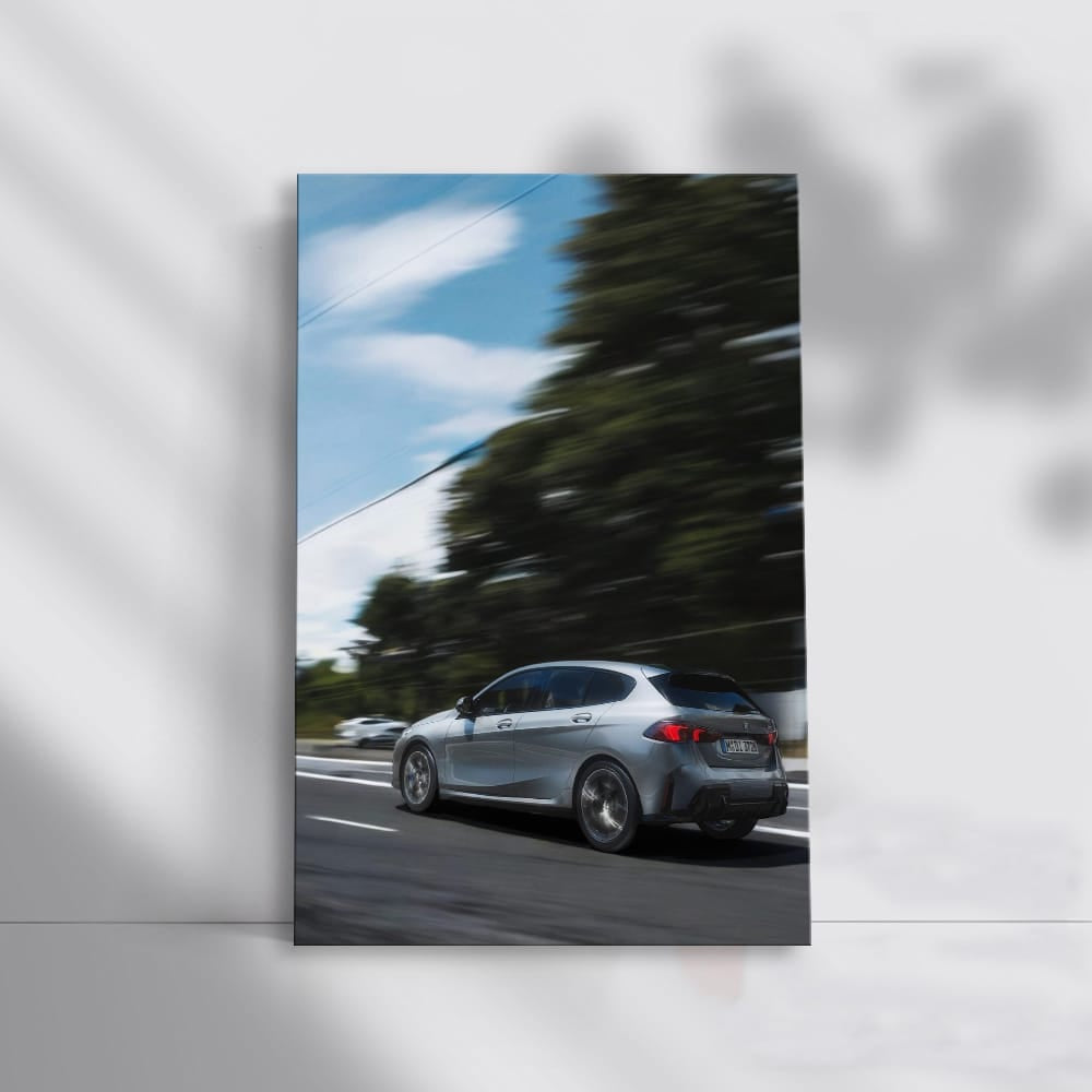 Gray BMW 1 Series in Motion - Sleek and Dynamic Ride
