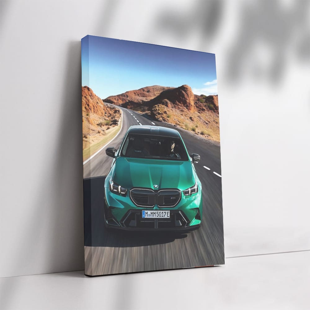 BMW M5 G90 Sedan in Green Cruising on Road - Power and Style