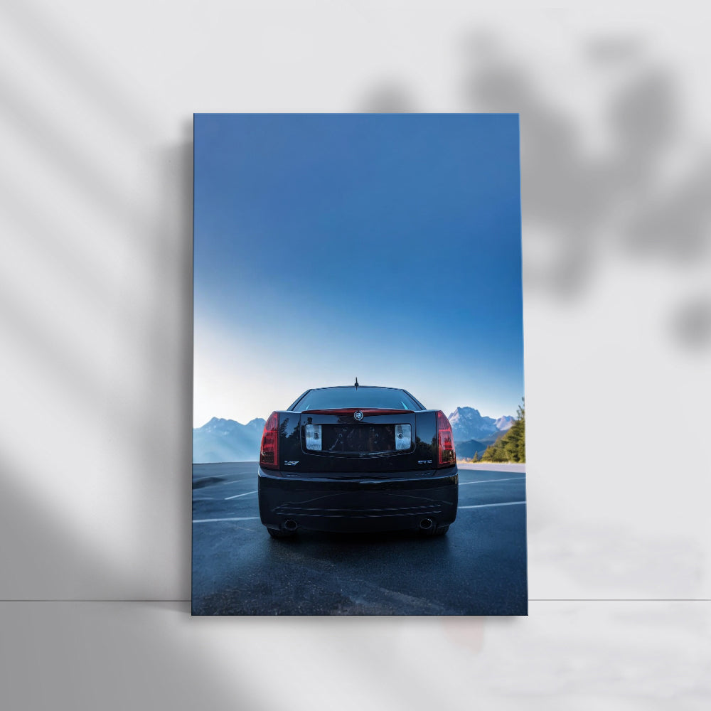 Black Cadillac in Snowy Mountains - Elegance Meets Adventure