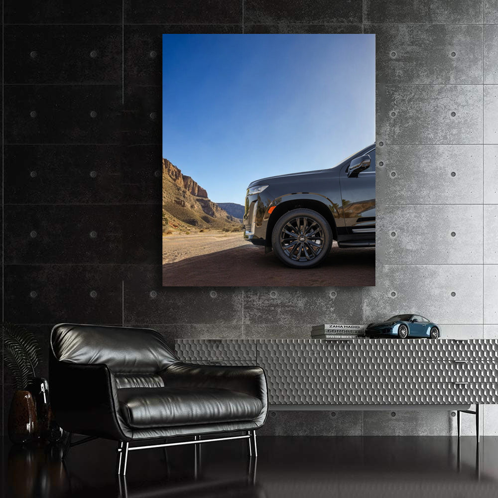 Sleek Black Cadillac Navigates Mountain Roads - Powerful Elegance