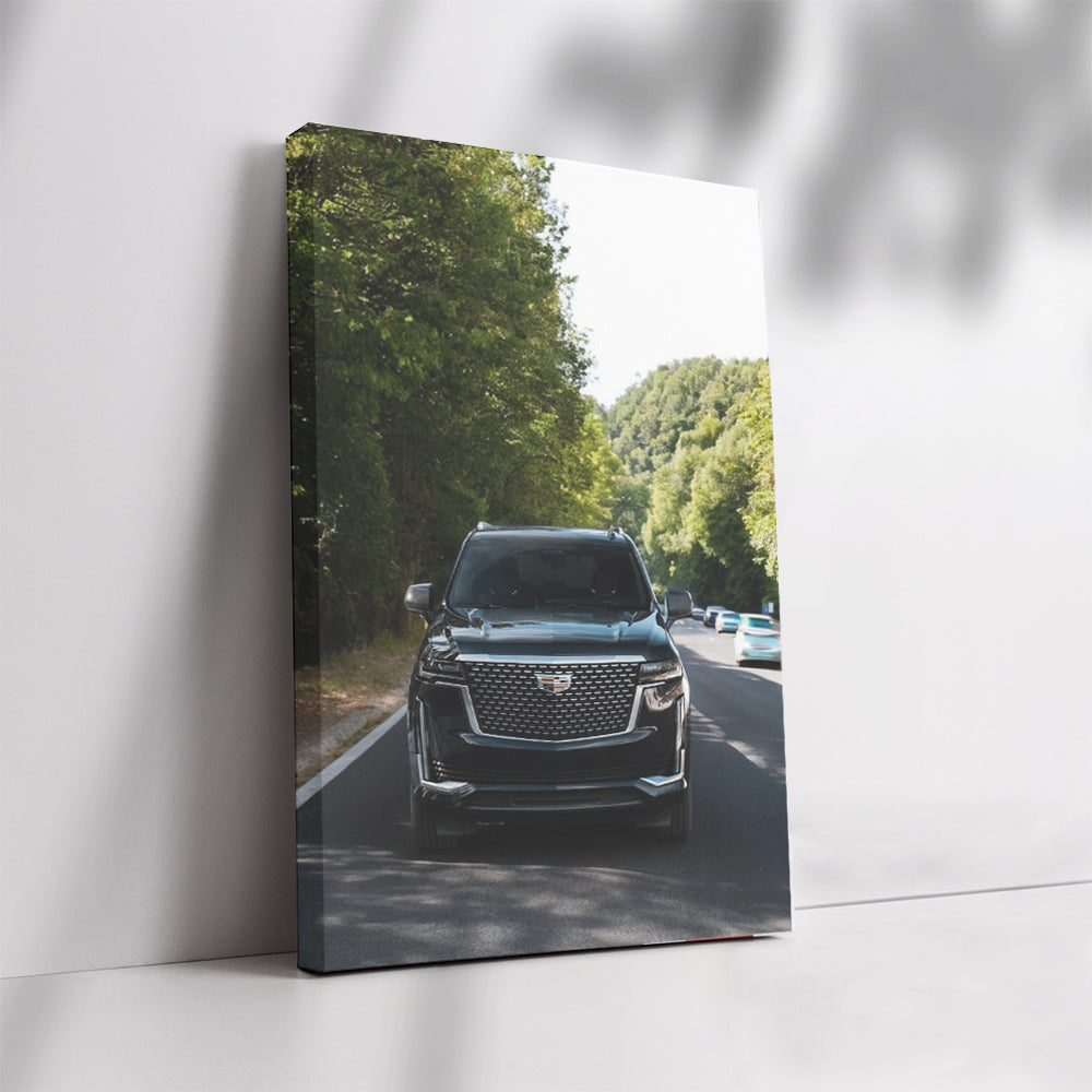 Sleek Black Cadillac Cruising Highway - Elegance in Motion