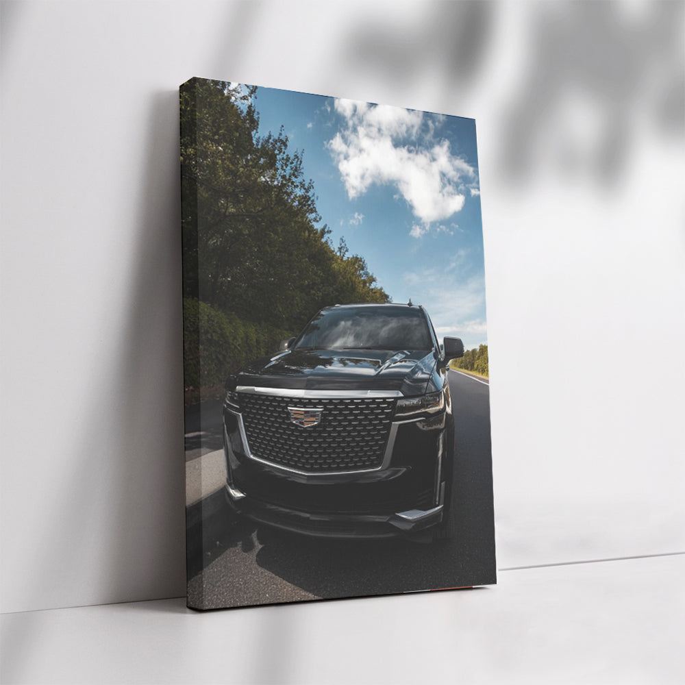 Sleek Black Cadillac Cruising Road - Elegance in Motion