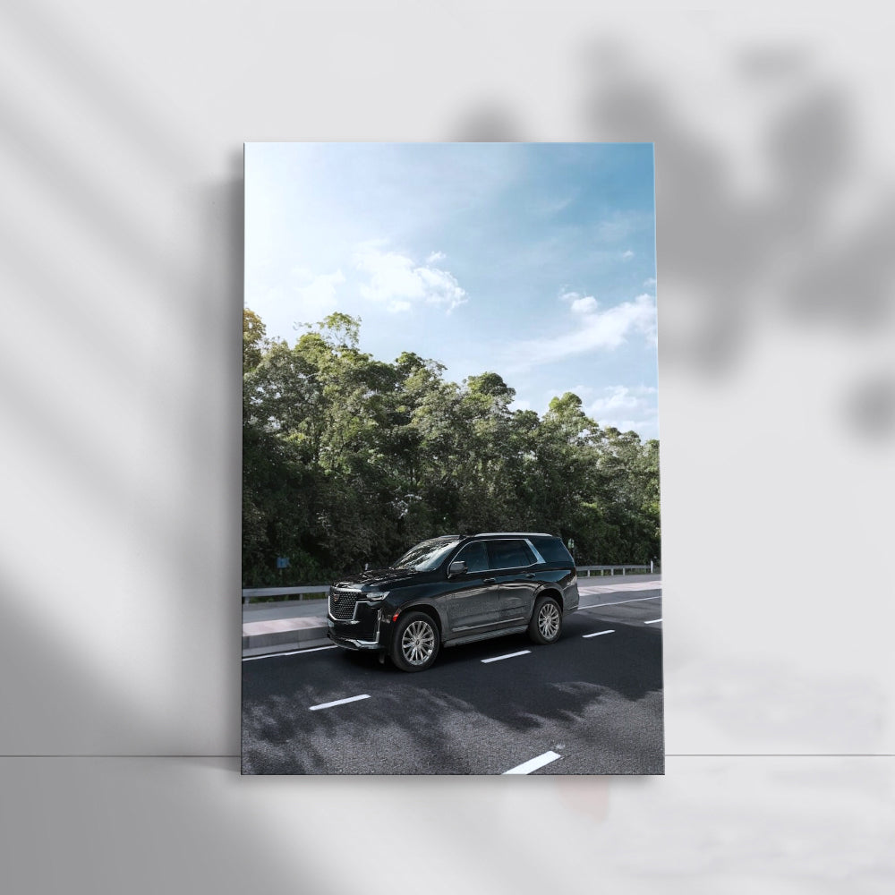 Sleek Black Cadillac Cruising Highway - Pure Luxury