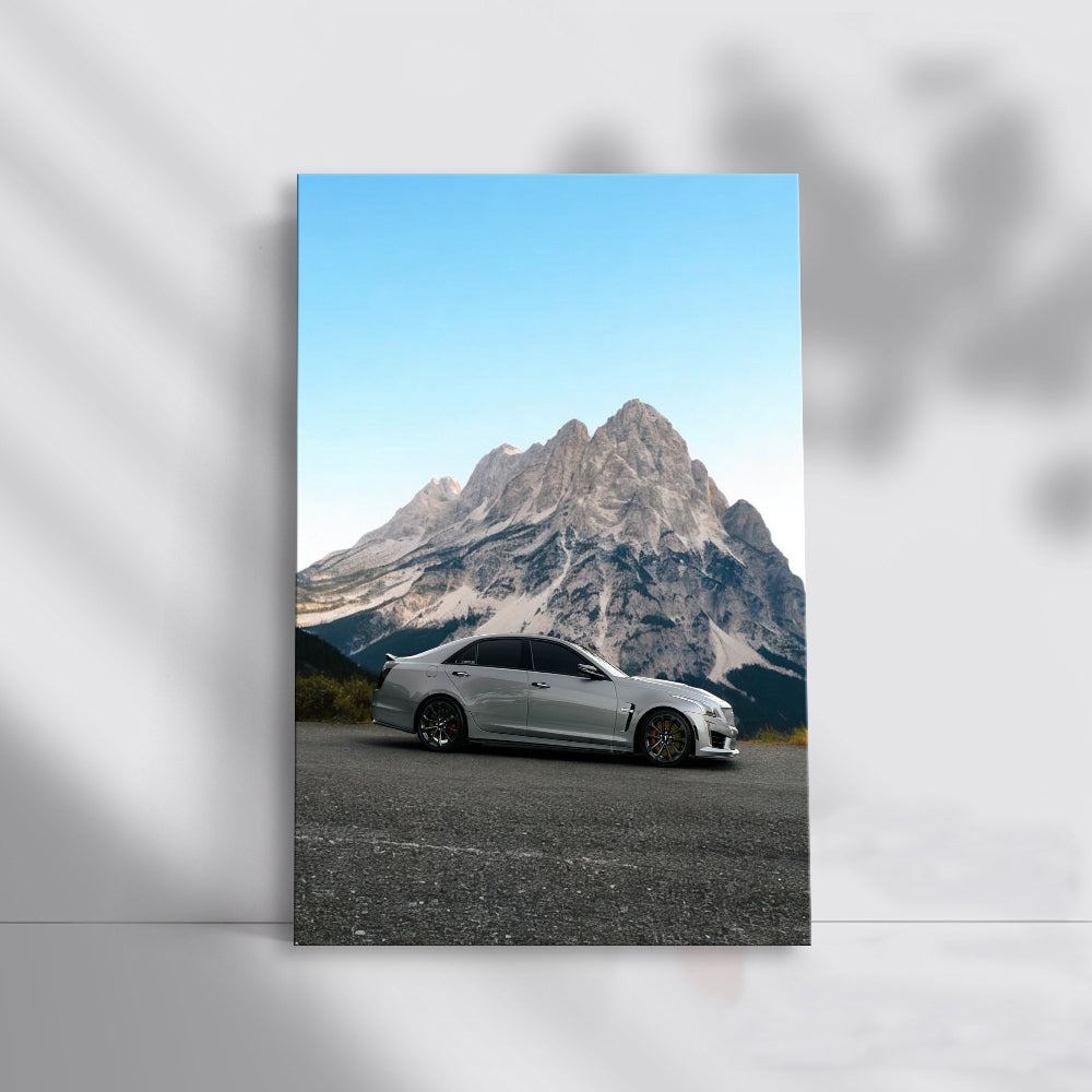 Cadillac Gray with Snowy Mountains - Luxury in Motion