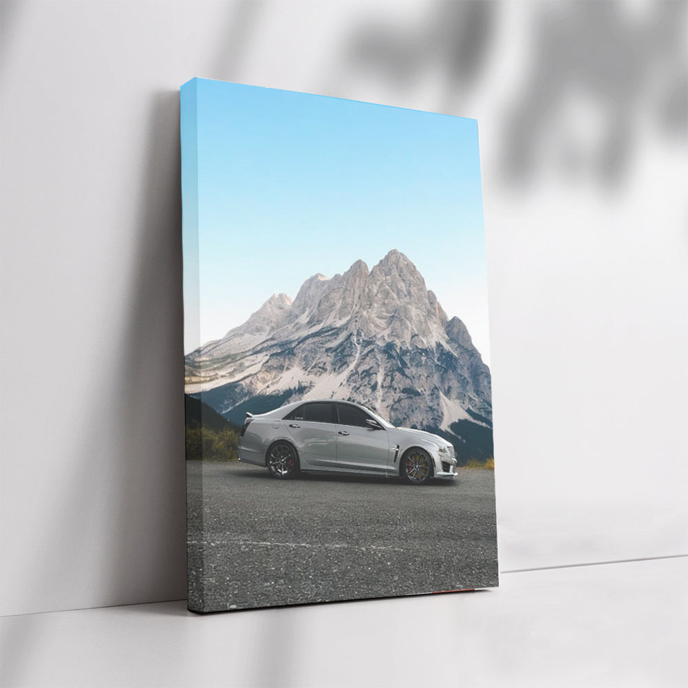Cadillac Gray with Snowy Mountains - Luxury in Motion