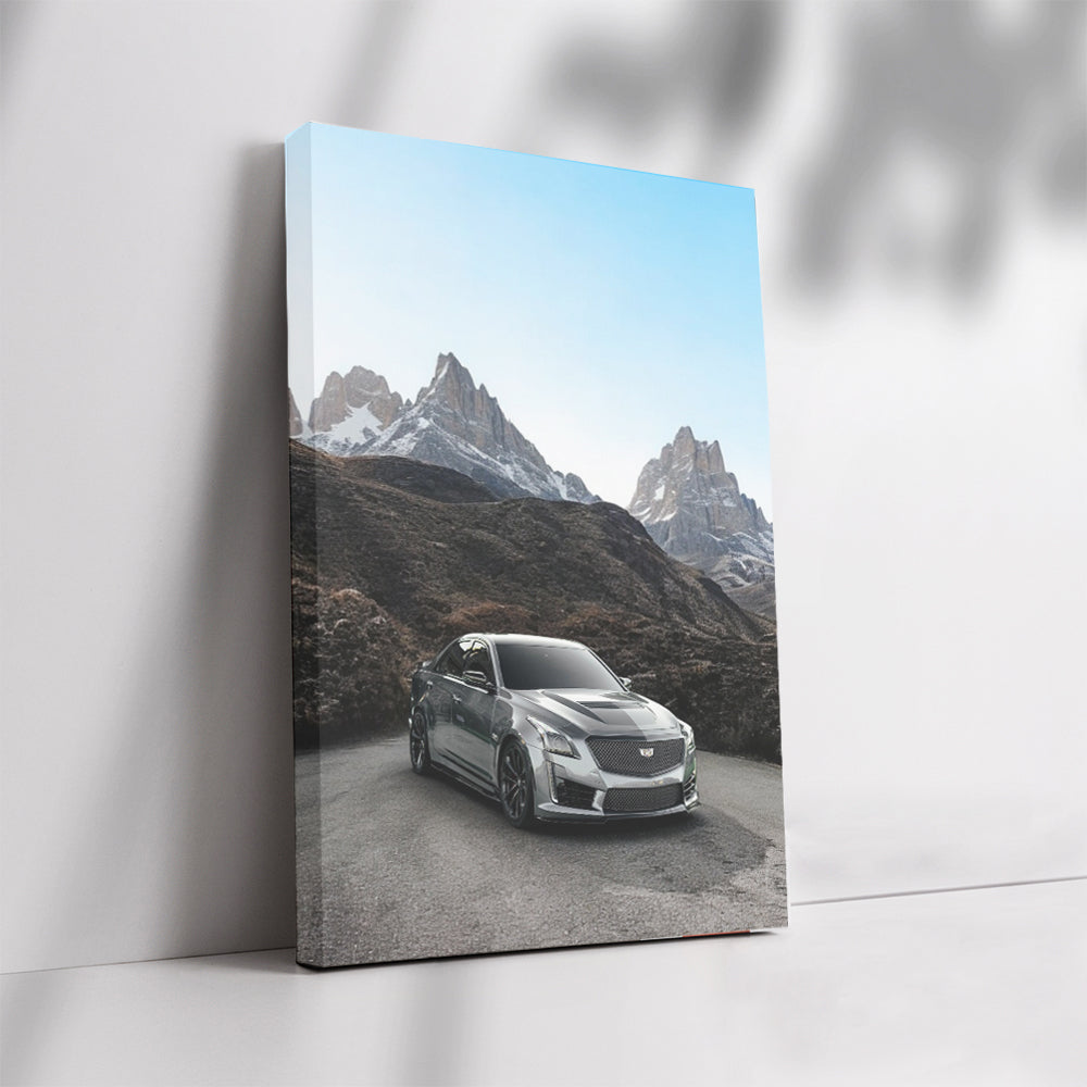 Gray Cadillac with Snowy Mountains - Elegance and Power