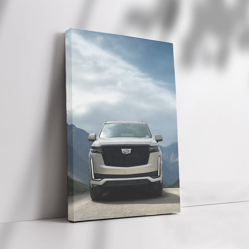Majestic Cadillac Among Mountain Peaks - Power and Elegance