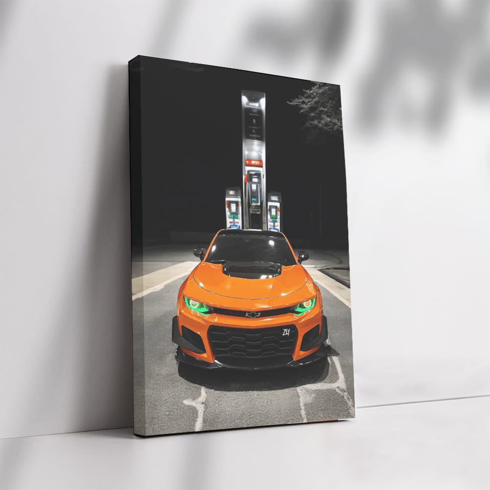 Vibrant Orange Chevrolet Camaro at Fuel Stop - Iconic Power