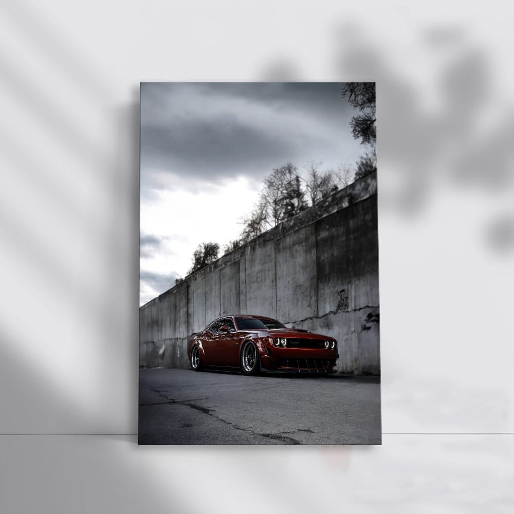 Red Dodge by Concrete Wall - Bold and Powerful Design