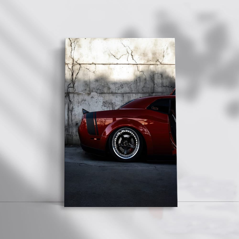 Red Dodge by Concrete Wall - Bold and Dynamic Design