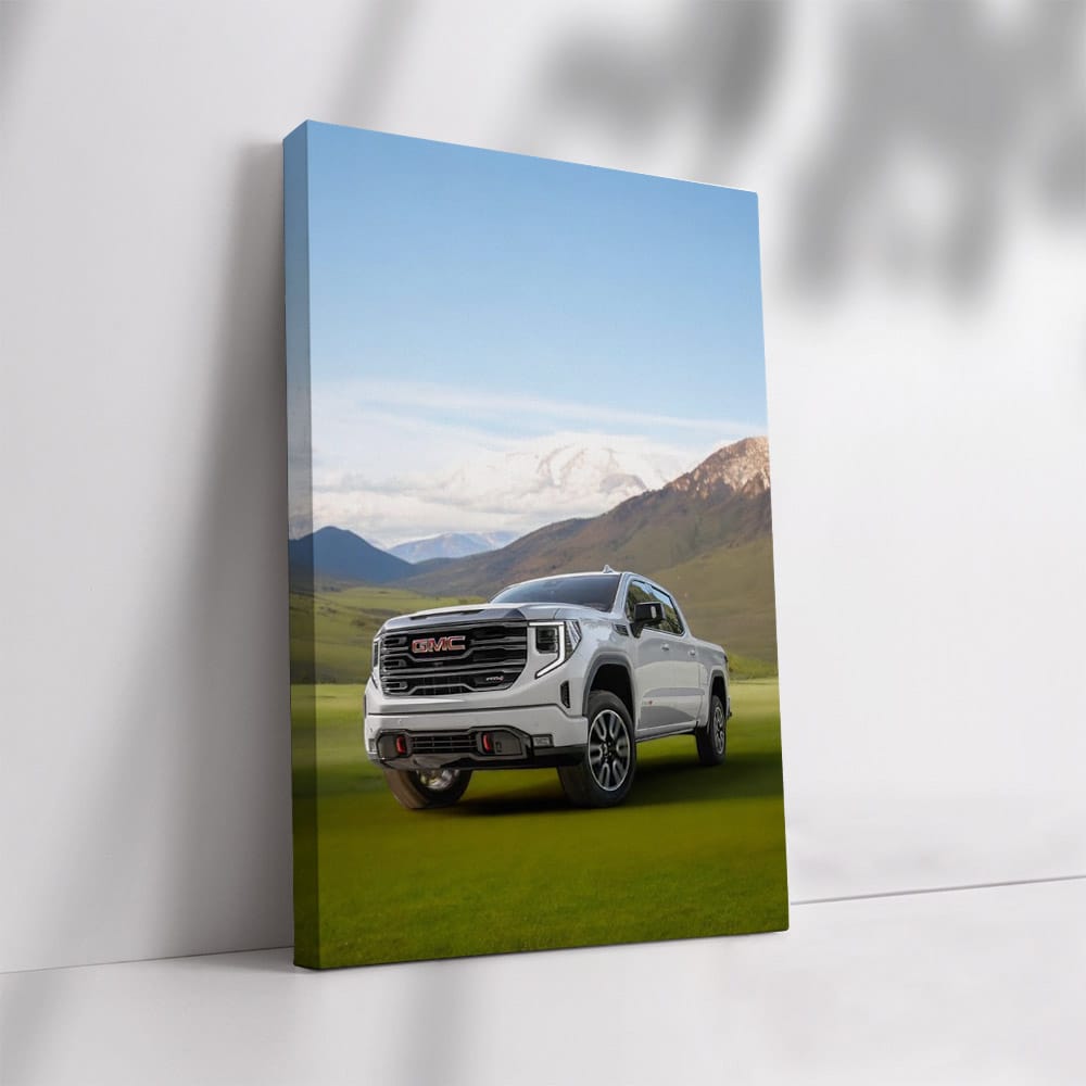GMC Sierra on Green Lawn, Majestic Mountains Behind - Rugged Power