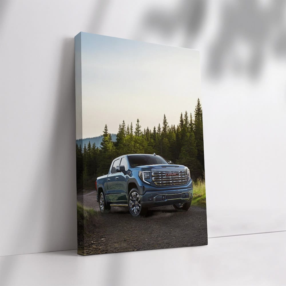 GMC Sierra Tackles Rocky Path, Majestic Pines Behind - Rugged Elegance