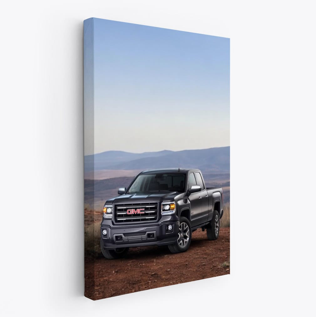 GMC Sierra Conquering Rugged Terrain with Distant Horizon - Tough and Reliable