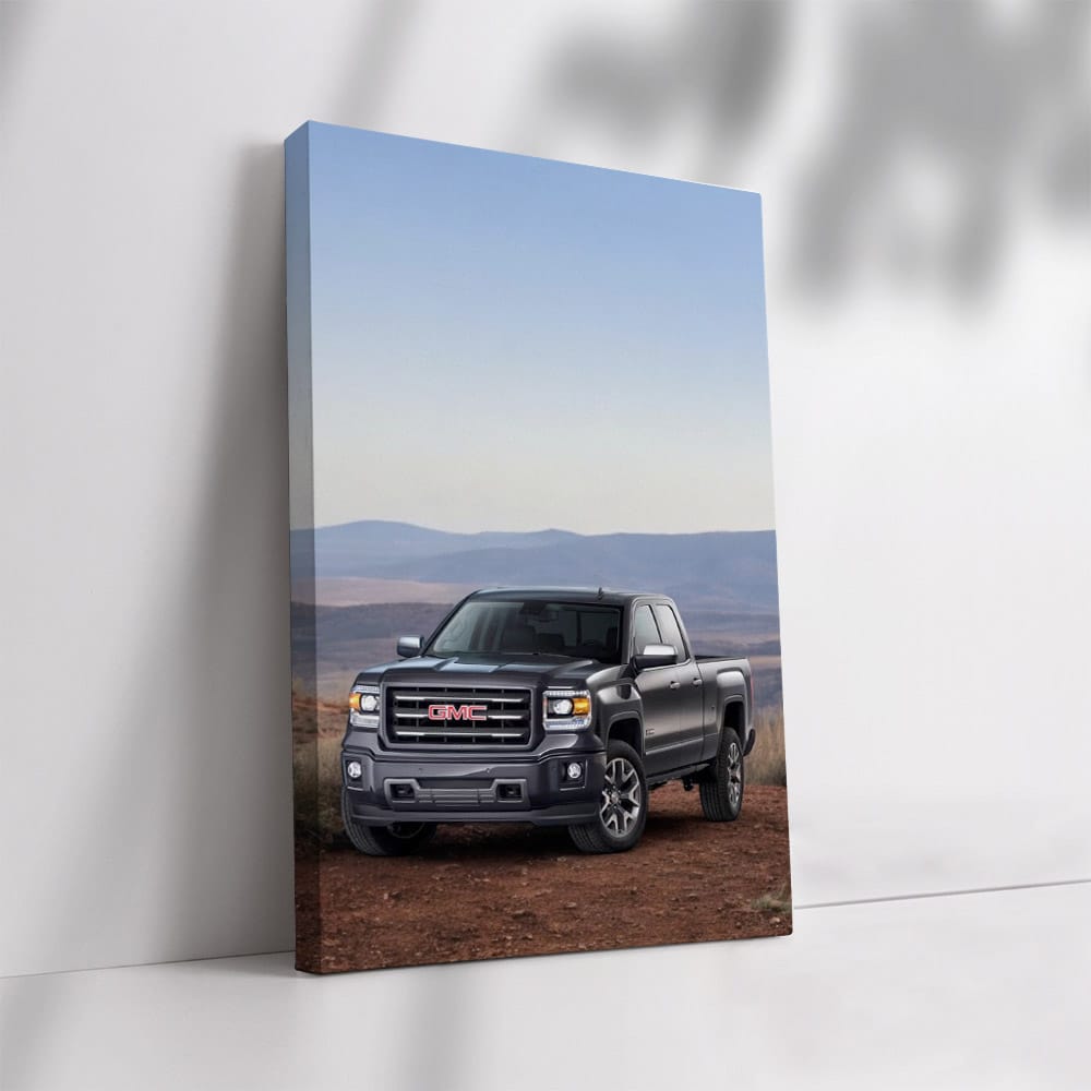 GMC Sierra Conquering Rugged Terrain with Distant Horizon - Tough and Reliable