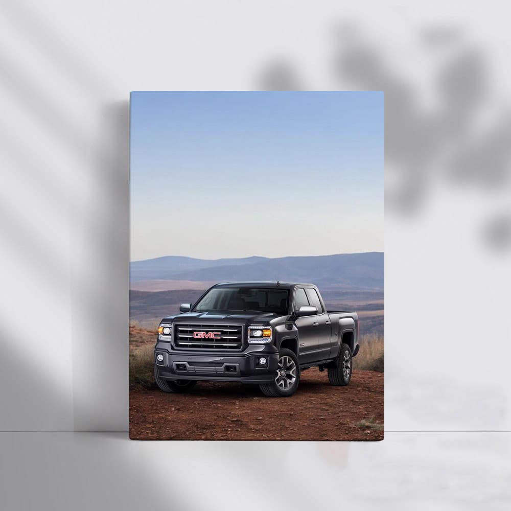 GMC Sierra Conquering Rugged Terrain with Distant Horizon - Tough and Reliable