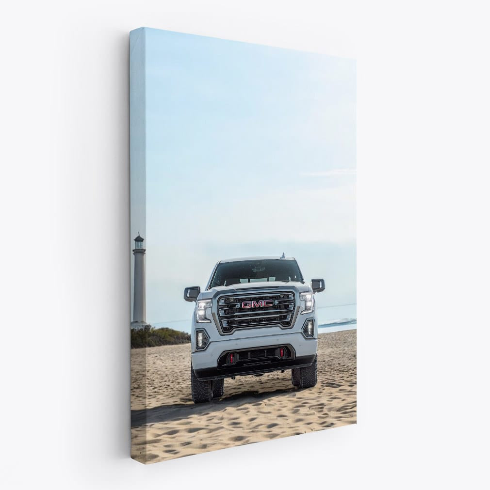 GMC Sierra on Beach with Lighthouse - Rugged Adventure