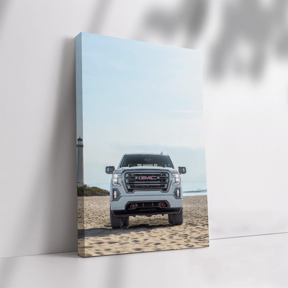 GMC Sierra on Beach with Lighthouse - Rugged Adventure