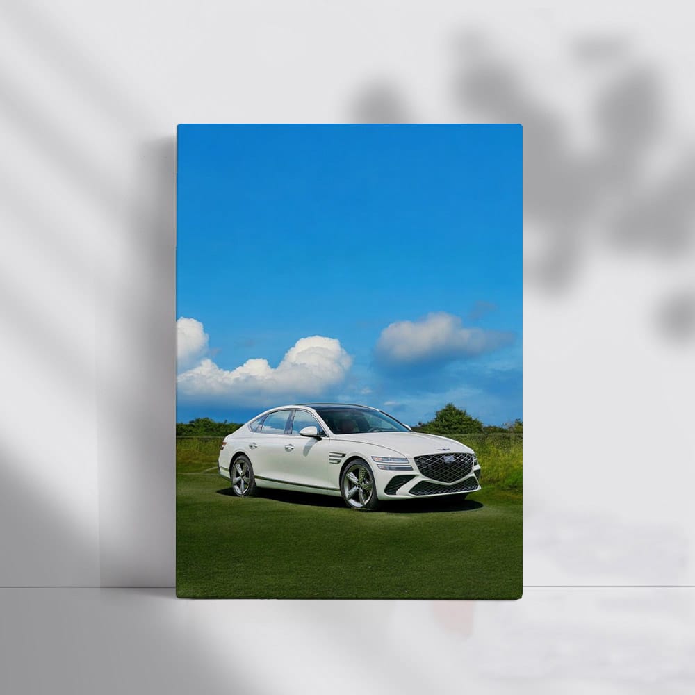 Genesis G80 Under Clear Sky: Elegance in Motion