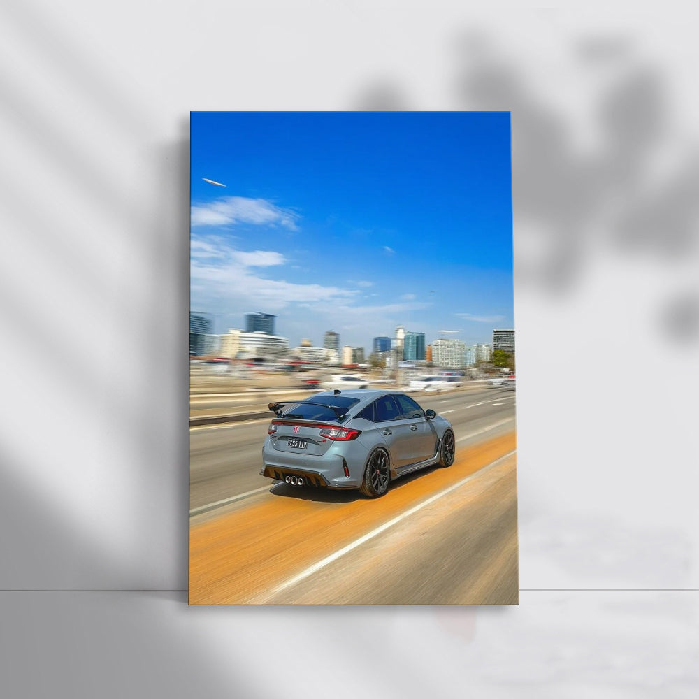 Honda Civic Driving with Urban Backdrop - Sleek and Reliable