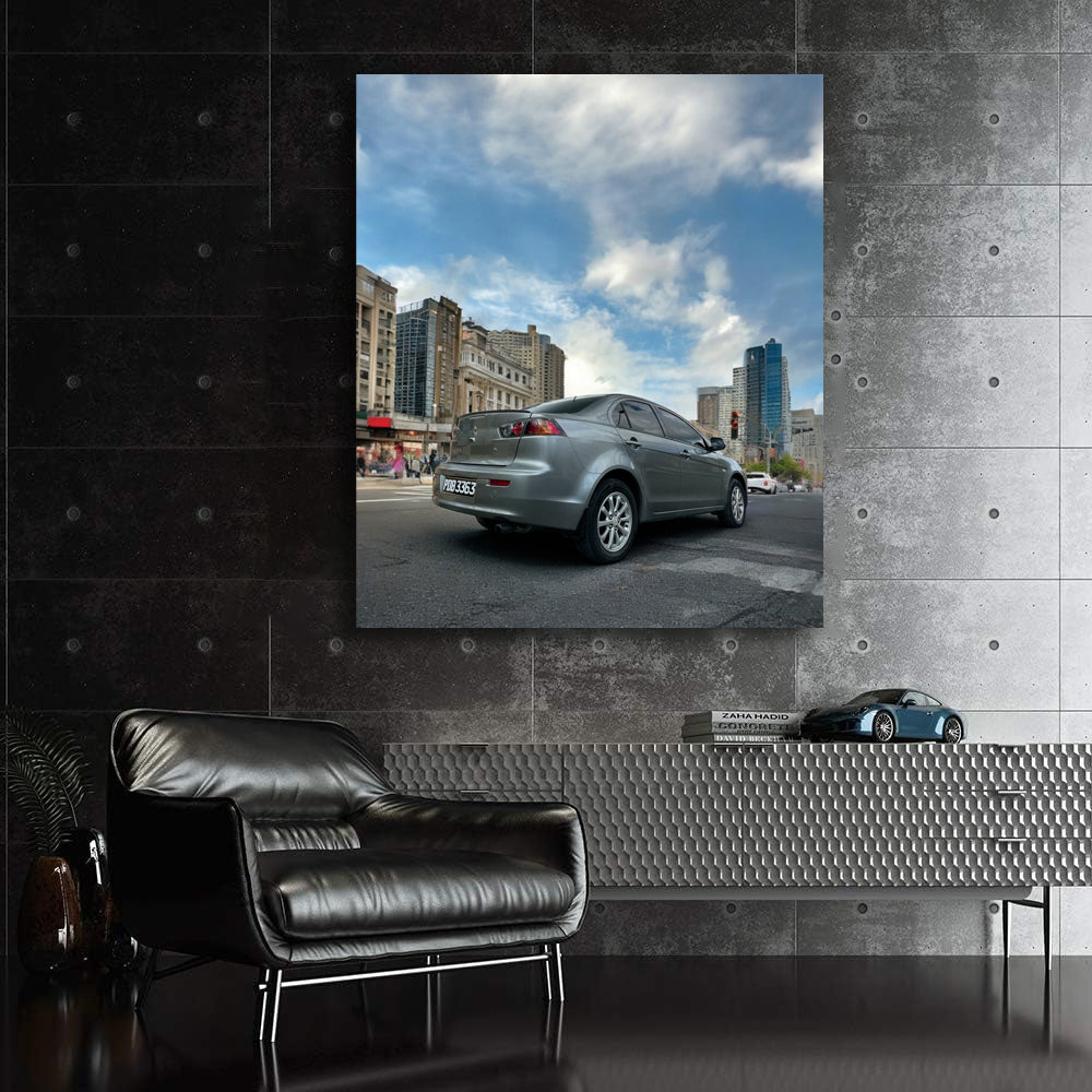 Gray Mitsubishi Lancer Cruising Through Urban Streets - Sleek