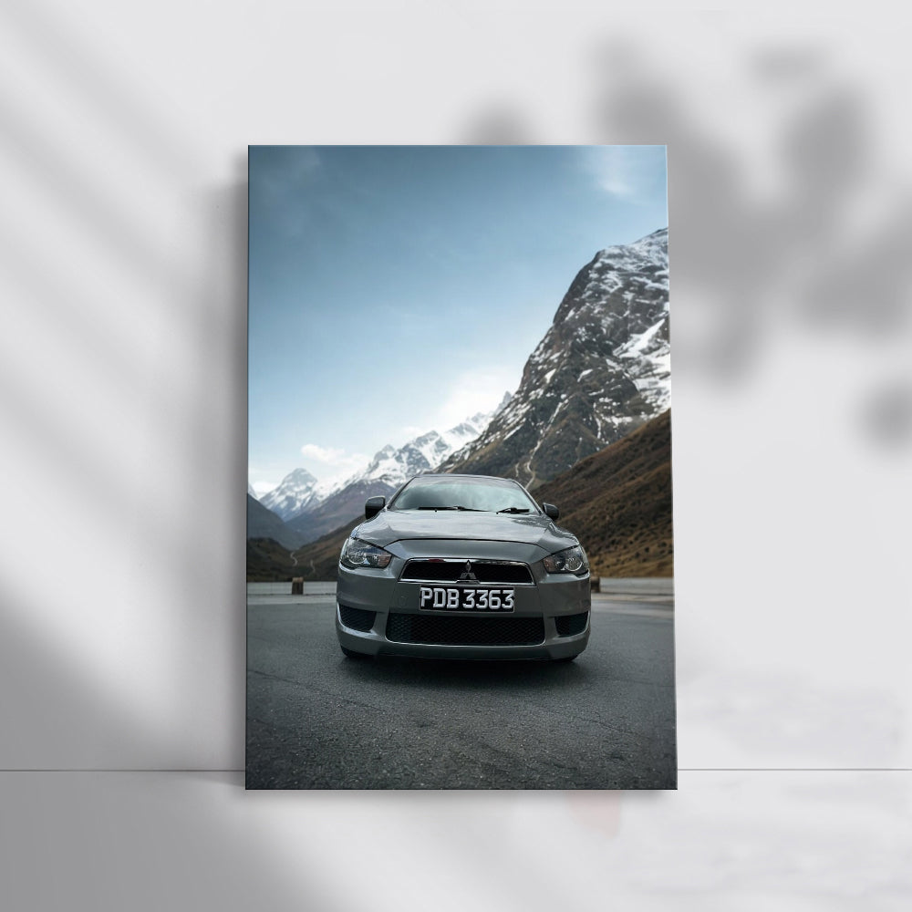 Grey Mitsubishi Lancer Conquering Mountain Roads - Dynamic Drive