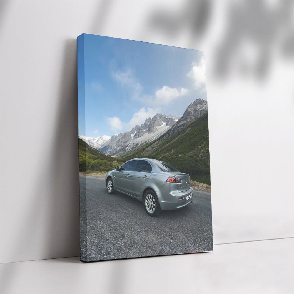 Grey Mitsubishi Lancer in Mountainous Terrain - Rugged Elegance