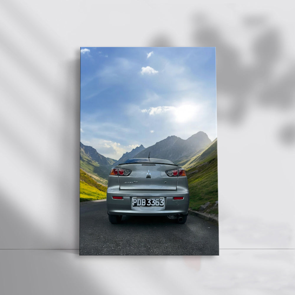 Grey Mitsubishi Lancer in Mountain Landscape - Rugged Elegance