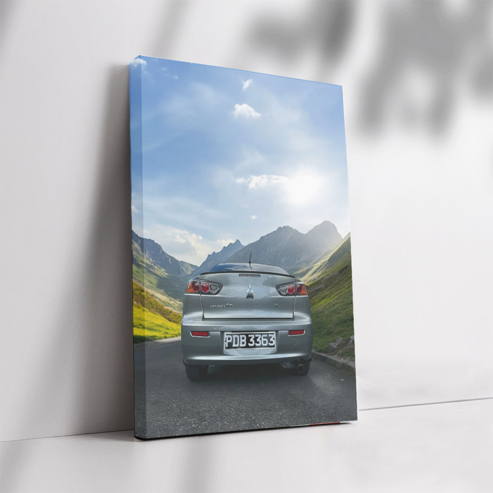 Grey Mitsubishi Lancer in Mountain Landscape - Rugged Elegance