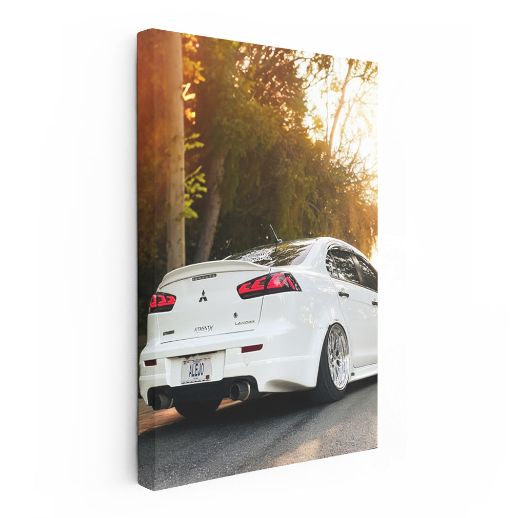 White Mitsubishi Lancer at Sunset - Sporty Elegance