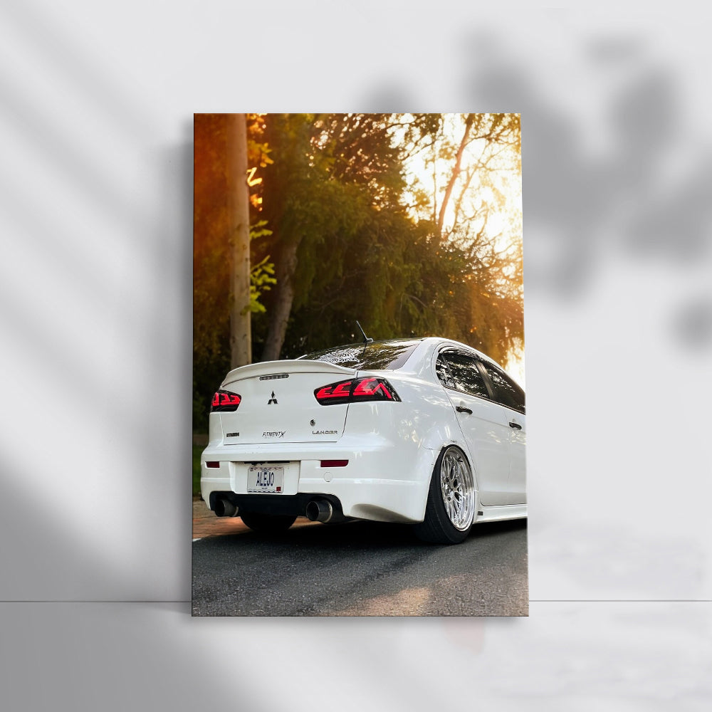 White Mitsubishi Lancer at Sunset - Sporty Elegance
