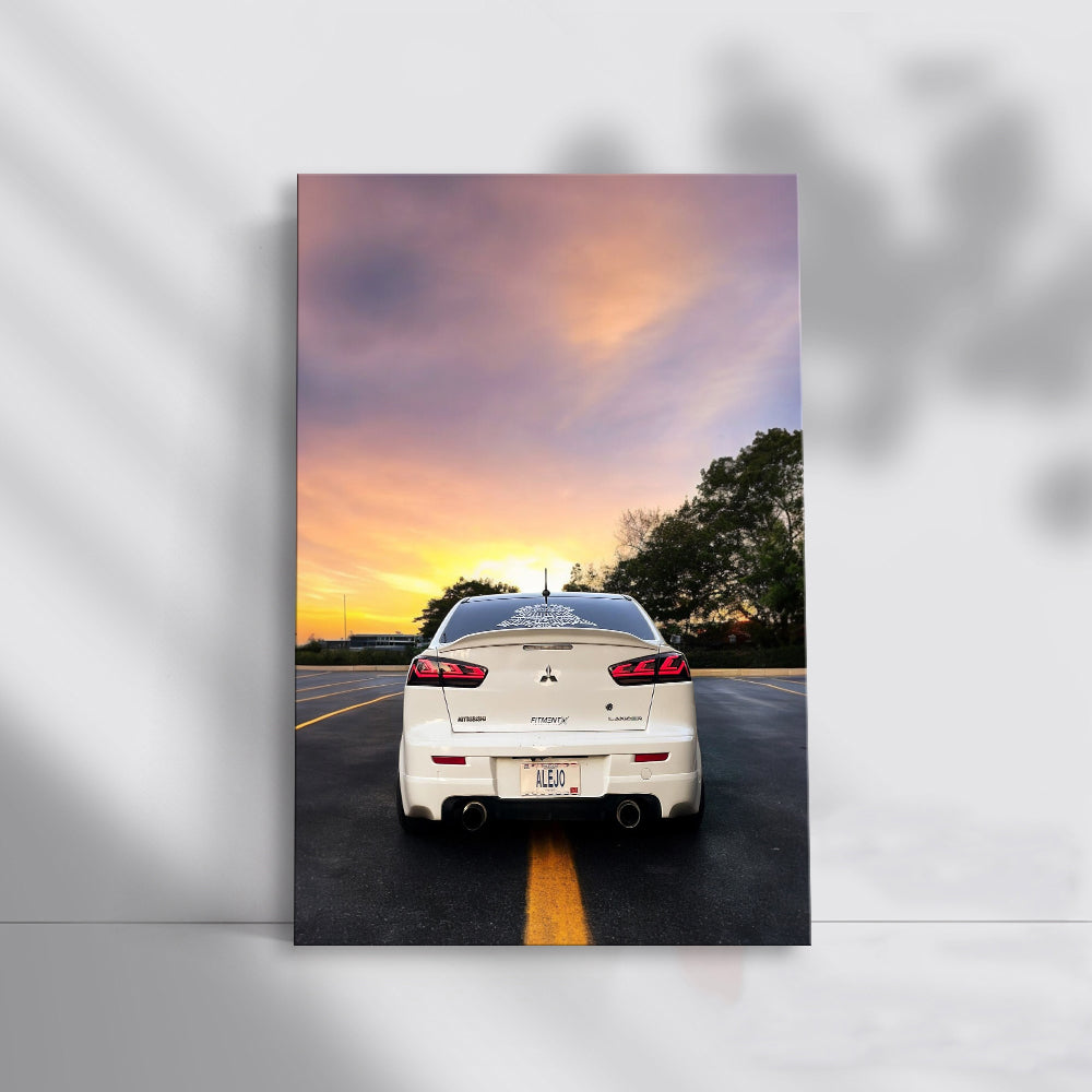 White Mitsubishi Lancer at Sunset - Sporty Elegance